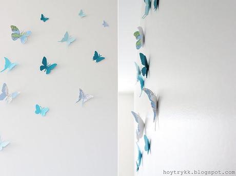 Mariposas hechas con mapas para decorar la pared