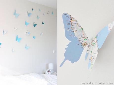 Mariposas hechas con mapas para decorar la pared