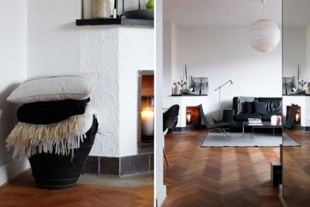 52m² de estilo nórdico en masculino suelo de parquet espigado sofá de cuero negro silla eames blanco Poul Kjærholm PK 22 de Poul Kjaerholm para Fritz Hansen piel cordero decoración mesa de cristal y metal estilo nórdico estilo escandinavo estilo decoración masculino diseño nórdico decoración sueca decoración nórdica decoración espacios pequeños decoración en blanco negro y gris decoración con flexos