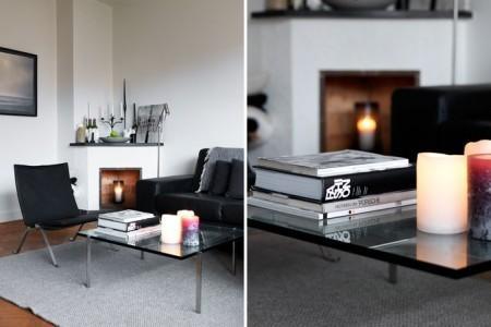 52m² de estilo nórdico en masculino suelo de parquet espigado sofá de cuero negro silla eames blanco Poul Kjærholm PK 22 de Poul Kjaerholm para Fritz Hansen piel cordero decoración mesa de cristal y metal estilo nórdico estilo escandinavo estilo decoración masculino diseño nórdico decoración sueca decoración nórdica decoración espacios pequeños decoración en blanco negro y gris decoración con flexos