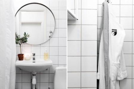 52m² de estilo nórdico en masculino suelo de parquet espigado sofá de cuero negro silla eames blanco Poul Kjærholm PK 22 de Poul Kjaerholm para Fritz Hansen piel cordero decoración mesa de cristal y metal estilo nórdico estilo escandinavo estilo decoración masculino diseño nórdico decoración sueca decoración nórdica decoración espacios pequeños decoración en blanco negro y gris decoración con flexos