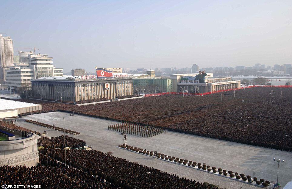 FORCED DEVOTION: Thousands of North Korean people paying their respects during the National Memorial service for their late leader Kim Jong-Il at Kim Il Sung Square in Pyongyang on December 29 