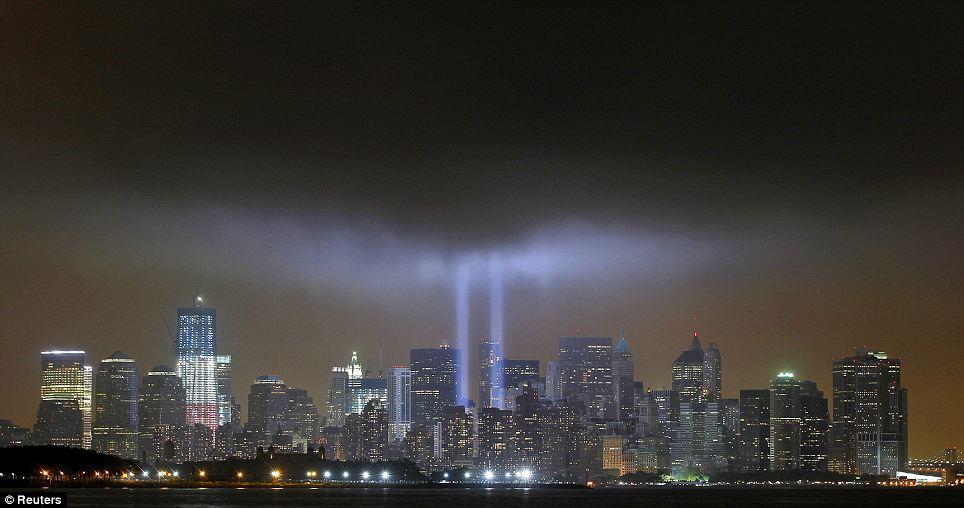 LIGHT FANTASTIC: The Tribute in Lights is illuminated next to One World Trade Center during events marking the 10th anniversary of the 9/11 attacks on the World Trade Center in New York, September 11