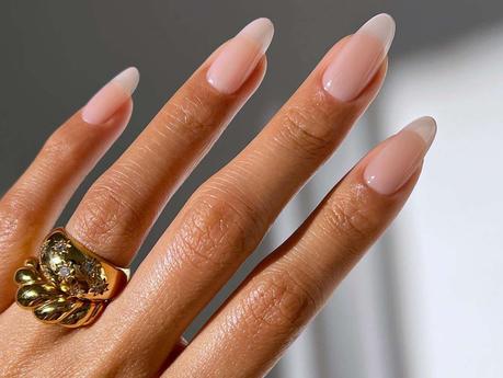 Translucent peachy clear manicure with glossy finish