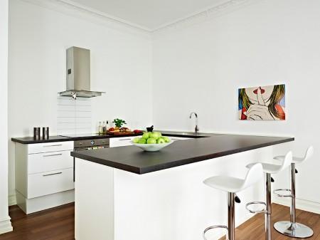 Un rectángulo de estilo nórdico de 66m² suelo de madera oscura pisos pequeños estilo nórdico muebles de ikea muebles blancos espacios diáfanos diseño de interiores decoración pisos pequeños decoración estilo nórdico decoración en blanco decoración de interiores casa rectangular