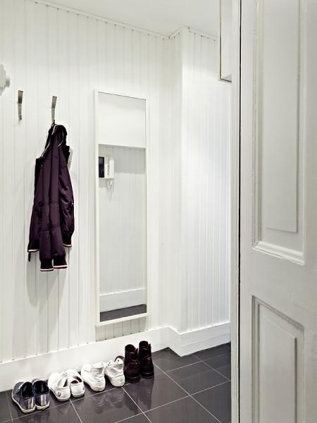 Un rectángulo de estilo nórdico de 66m² suelo de madera oscura pisos pequeños estilo nórdico muebles de ikea muebles blancos espacios diáfanos diseño de interiores decoración pisos pequeños decoración estilo nórdico decoración en blanco decoración de interiores casa rectangular