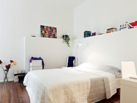 Un rectángulo de estilo nórdico de 66m² suelo de madera oscura pisos pequeños estilo nórdico muebles de ikea muebles blancos espacios diáfanos diseño de interiores decoración pisos pequeños decoración estilo nórdico decoración en blanco decoración de interiores casa rectangular