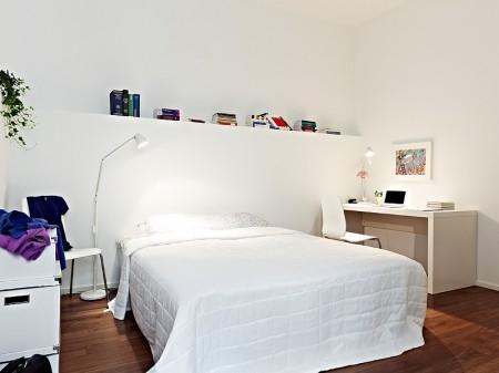 Un rectángulo de estilo nórdico de 66m² suelo de madera oscura pisos pequeños estilo nórdico muebles de ikea muebles blancos espacios diáfanos diseño de interiores decoración pisos pequeños decoración estilo nórdico decoración en blanco decoración de interiores casa rectangular