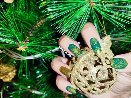 Diseño de uñas en verde y dorado para Navidad o Año Nuevo