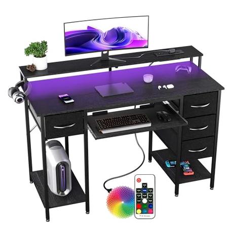 BEXEVUE Escritorio Moderno LED con Regleta Enchufes - 120x50 cm Mesa Gaming Ordenador con Bandeja para Teclado, 4 Cajones Reversibles, Grande Soporte Monitor para Estudiar Jugar Trabajar Dormitorio
