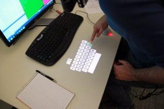 OmniTouch: a wearable system that enables interactive multitouch in everyday surfaces