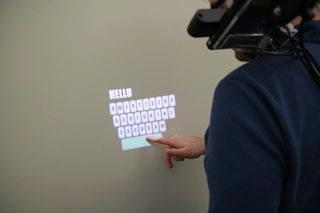 OmniTouch: a wearable system that enables interactive multitouch in everyday surfaces