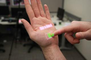 OmniTouch: a wearable system that enables interactive multitouch in everyday surfaces
