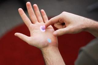 OmniTouch: a wearable system that enables interactive multitouch in everyday surfaces