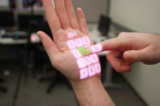 OmniTouch: a wearable system that enables interactive multitouch in everyday surfaces