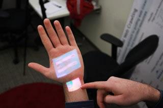 OmniTouch: a wearable system that enables interactive multitouch in everyday surfaces