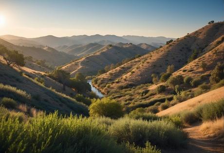 A picturesque landscape of Sepulveda, showcasing rolling hills, a winding river, and lush greenery under a clear blue sky