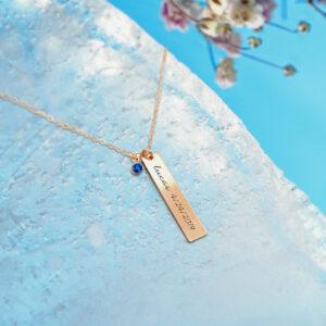 Explorando la Majestuosidad de la Perla Piedra de Junio Graba tu momento único en nuestro dije de oro 18k con gemas preciosas, una joya que cuenta tu historia persona