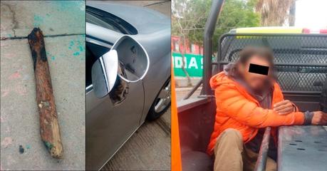 Detienen a hombre con mazo en mano por dañar autos en Río Españita