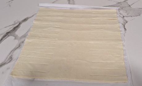 Trenza de hojaldre rellena de jamón serrano y queso