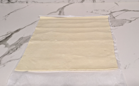 Trenza de hojaldre rellena de jamón serrano y queso