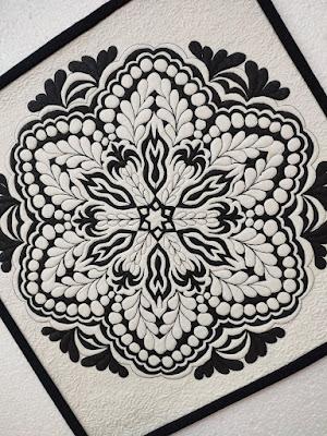 Una clase de acolchado a máquina