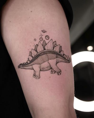 Dinosaurios en la piel por María Fernández