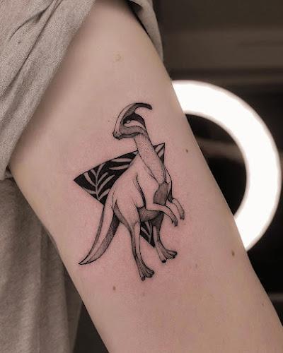 Dinosaurios en la piel por María Fernández