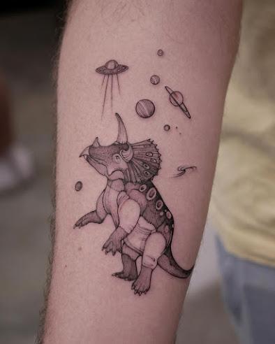 Dinosaurios en la piel por María Fernández