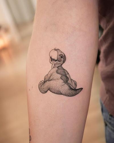 Dinosaurios en la piel por María Fernández