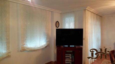 - Combina, cortinas con Estores.