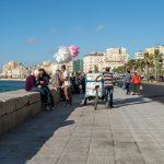 people walking on sidewalk during daytime