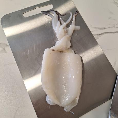 Ensalada de lentejas de tierra de campos con sepia y verduras