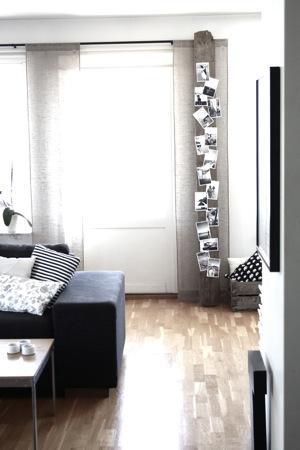 Fotos en un tablón de madera vertical