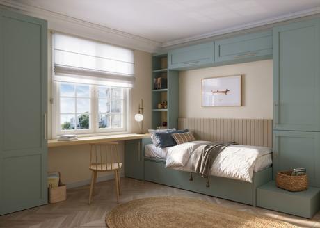Dormitorio juvenil con cama nido y zona de estudio a medida