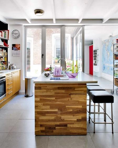 De vieja imprenta a piso diáfano ventana de techo Velux techos altos decoración sofá de Le Corbusier silla barcelona mies van de rohe papel pintado tres tintas Papel pintado con motivos pop de Gancedo muebles de diseño lofts en madrid decoración Lámpara vintage Lámpara de sobremesa artemide diseño de lofts pisos diáfanos áticos diseño de interiores decoracion de lofts decoración de interiores cocina de ikea