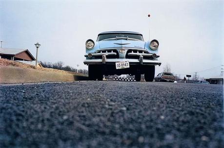 William-Eggleston.-Untitled-(Blue-Car-on-Suburban-Street)