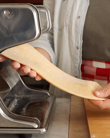 estirar masa en maquina