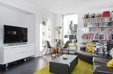 sofá cuero negro piso para chicos muebles de ikea muebles de diseño iconos estilo nórdico estilo nórdico diseño de terrazas diseño de exteriores diseño de aticos diseño americano sillas eames decoración pisos pequeños decoración piso masculino decoración masculina decoración espacios pequeños diáfanos decoración de áticos ático con terraza suelo teca 