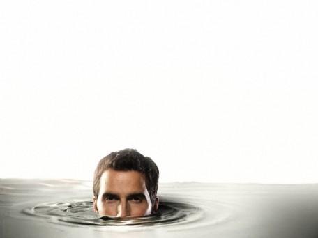 Man submerged in water