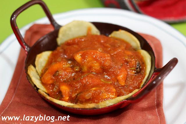 Mejillones picantes, en su nido de patata