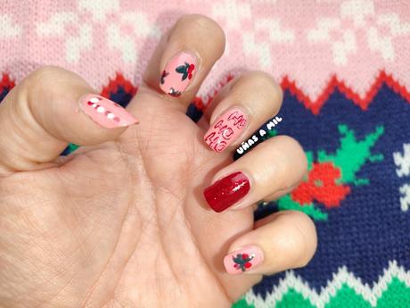 Diseño de uñas para Navidad en rosa y rojo